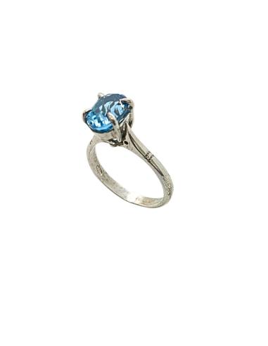 Bague argent rhodié antiallergique avec véritable topaze bleue